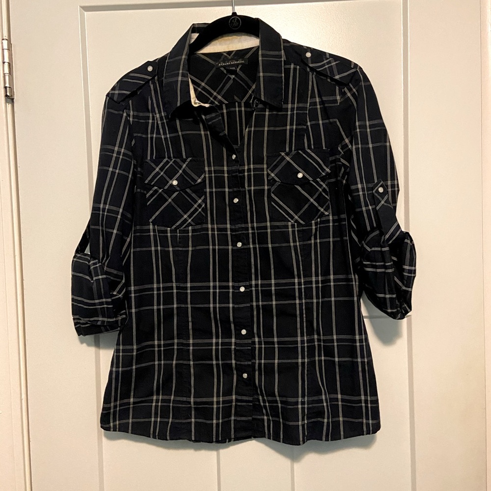 Long or short sleeve snap up blouse.
